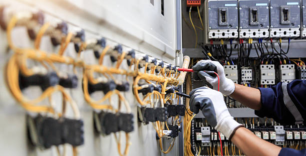 Professional Electrician technician working in Florissant, MO